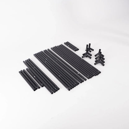 Black metal poles and connectors for golf simulator enclosure frame setup