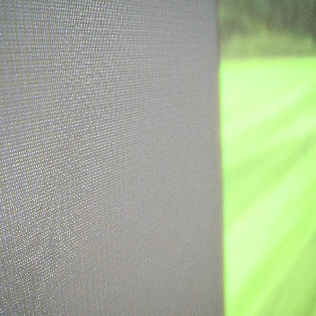High-quality golf simulator impact screen with textured surface and vibrant green display